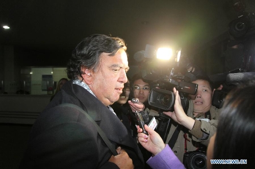  U.S. Former New Mexico state governor Bill Richardson answers questions from the press after arriving at Sunan airport of Pyongyang, the Democratic People's Republic of Korea (DPRK), on Jan. 7, 2013. Bill Richardson and Eric Schmidt arrived here on Monday for a 