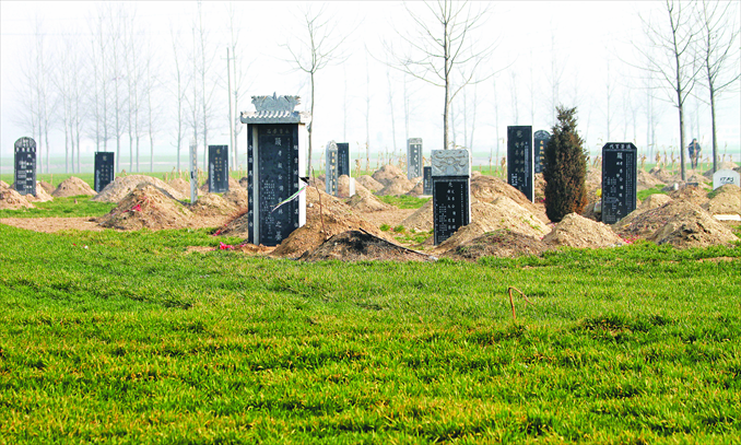 New tombs are seen re-erected in Zhoukou, Henan Province on February 28. Photo: CFP