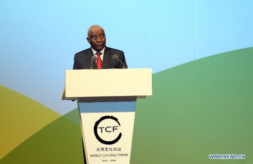 Mozambican President Armando Guebuza delivers a speech at the opening ceremony of the second World Cultural Forum (Taihu, China) in Hangzhou, capital of east China's Zhejiang Province, May 18, 2013. Established in 2007 as a non-governmental organization based in China, the World Cultural Forum (Taihu, China) is committed to creating an open, multilateral and inclusive platform for international cultural exchanges. (Xinhua/Han Chuanhao) 