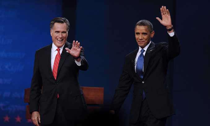 US President Barrack Obama (R) and Republican presidential candidate Mitt Romney attend the first presidential debate at Denver University, Denver, Colorado, the United States, October 3, 2012. Photo: Xinhua