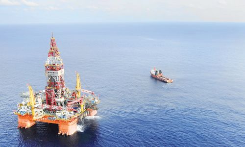 The sixth-generation semi-submersible CNOOC 981 is seen in the South China Sea, 320 kilometers southeast of Hong Kong. This is the first deep-water drilling rig developed in China. It will begin operations tomorrow in a sea area at a water depth of 1,500 meters, China National Offshore Oil Corp (CNOOC) said Monday. Photo: Xinhua