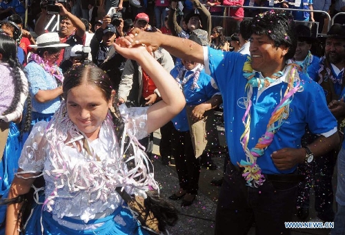 Bolivia's President Evo Morales (R) participates in the celebration of the 
