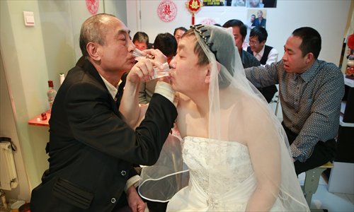 A gay couple pictured before their wedding was interrupted at a venue in Pinggu district Wednesday. Photo: CFP