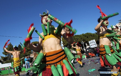 Chinese performers take part in the flowers parade during the 129th annual Nice Carnival parade, in Nice, southern France, March 2, 2013. (Xinhua/Gao Jing) 