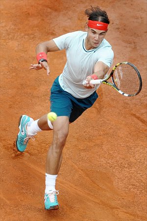 Spain's Rafael Nadal returns a ball to Latvian Ernests Gulbis on Thursday. Photo: CFP