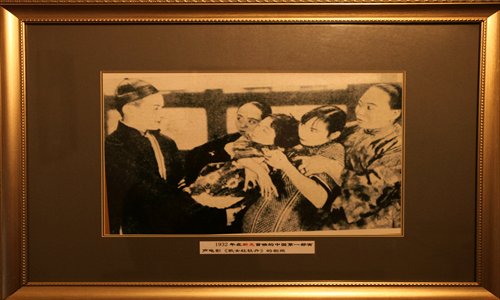 The poster of China's first home-made sound film Sing-song Girl Red Peony is on display at the cinema where it was originally screened. Photo: Cai Xianmin/GT