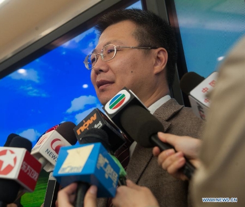 Cheng Jun, a spokesman with the Beijing Ditan Hospital, introduces the situation of a seven-year-old girl, who was infected with the H7N9 strain of bird flu, during a press conference in Beijing, capital of China, April 13, 2013. This was the first such case in the Chinese capital. The child is in stable condition. Two people who have had close contact with the child have not shown any flu symptoms, and the girl's parents were engaged in live poultry trading in a township of Shunyi District in Beijing's northeastern suburbs. (Xinhua/Zhang Yu) 