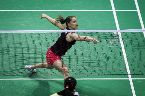 Juliane Schenk of Germany returns a ball against Ratchanok Intanon of Thailand during the women's singles final of the 2013 India Open badminton tournament in New Delhi, capital of India, April 28, 2013. Ratchanok Intanon won the championship 2-0. (Xinhua/Zheng Huansong) 