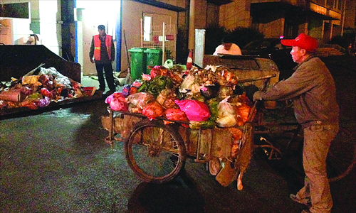Shen Xiangdang, father of Shen Kai, an urban management officer who was stabbed to death by a street vendor four years ago, works three jobs, as a parking lot guard, parking fee collector and garbage man. Photo: Zhang Qianye