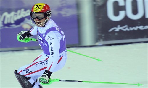Marcel Hirscher celebrates after winning the World Cup Slalom on Wednesday. Photo: CFP