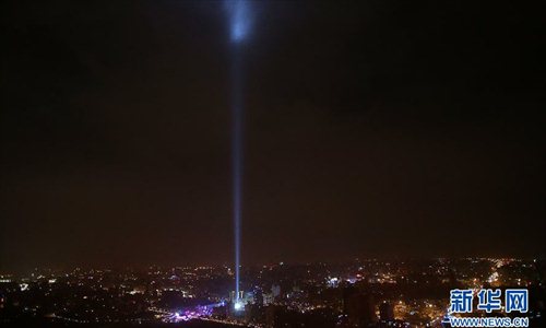 The lights of Beijing are seen at the China Millennium Monument to celebrate the New Year in Beijing, capital of China.  January 1, 2013. Photo: Xinhua
