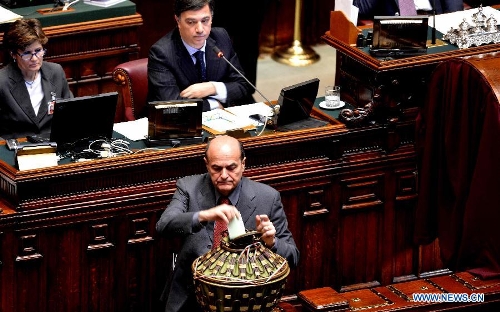 Democratic Party's (PD) leader Pier Luigi Bersani casts his ballot during the session in Italy's Chamber of Deputies in Rome, Italy, on March 16, 2013. Italy's new parliament on Saturday elected the speakers of the Chamber of Deputies and of the Senate, ending a two-day session on its second official day as the country's legislative body. (Xinhua/Xu Nizhi) 