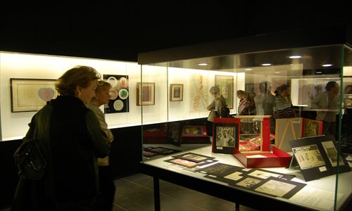Onlookers at the exhibition highlighting some of French artist Duchamp's original work. Photo: Jonny Clement Brown/GT
