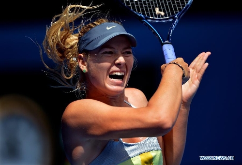 Maria Sharapova of Russia competes during the first round women's singles match against her compatriot Olga Puchkova on the first day of 2013 Australian Open tennis tournament in Melbourne, Australia, Jan. 14, 2013. Maria Sharapova won 2-0 to enter the next round. (Xinhua/Chen Xiaowei) 