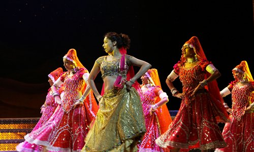 Bollywood dancers dazzle with glitzy costumes and hip-shimmying moves. Photo: Courtesy of The Merchants of Bollywood Company