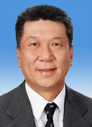 Edmund Ho Hau Wah is elected vice-chairperson of the 12th National Committee of the Chinese People's Political Consultative Conference (CPPCC) at the fourth plenary meeting of the first session of the 12th CPPCC National Committee in Beijing, capital of China, March 11, 2013.(Xinhua)