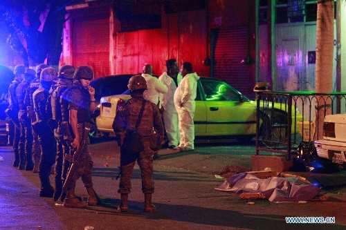 Soldiers guard the site of a shooting at a night club in the city of Guadalajara, state of Jalisco, western Mexico, on late March 31, 2013. According to the local press reports, on Sunday night a group of armed men shot employees and customers and threw a grenade at a night club. A similar attack occurred a few minutes later in another night club a few blocks away from the first one and was conducted by the same criminal group. Four people died and 29 others were injured in both shootings, said local press. (Xinhua/Xolo) 