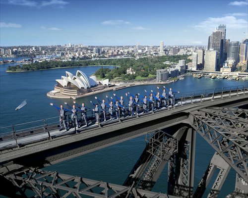 Climbers group poses for a photo along the Sydney Harbor Bridge. Photo: Courtesy of Australia Business Events 