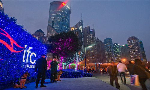 People walk through the Shanghai Lujiazui Finance and Trade Zone. Shanghai ranked 24th on the Global Financial Centers Index, a list of the world's most competitive financial hubs as compiled by UK-based think tank Z/Yen Group, down five positions from its place six months earlier. Photo: CFP