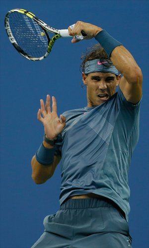 Rafael Nadal plays a forehand against Rogerio Dutra Silva during the 2013 US Open men's singles second round match on Thursday in New York. Photo: CFP