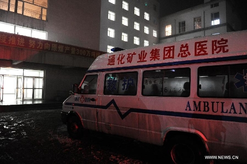 An ambulance is seen parking outside the office building of the Babao Coal Mine in Jiangyuan District in the city of Baishan, northeast China's Jilin Province, April 1, 2013. Another coal-mine gas explosion left six people dead and 11 missing in the coal mine on Monday, three days after a similar blast killed 28 miners at the same site. (Xinhua/Zhang Nan) 
