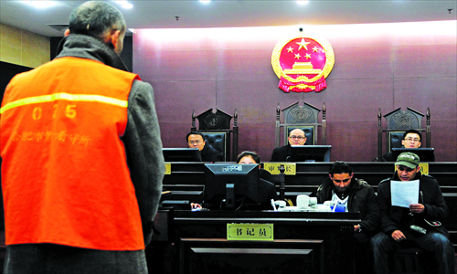 Judges hand down a verdict on a traffic offense at the Hefei Intermediate People's Court in Anhui Province. Photo: CFP