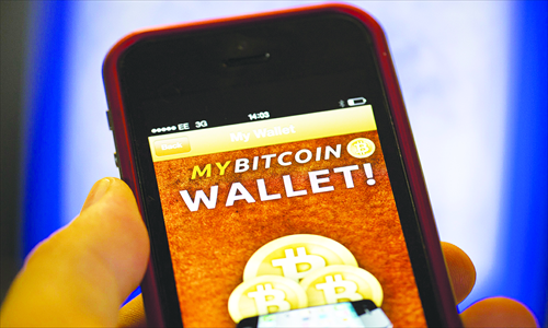 The Bitcoin Wallet smartphone app is displayed on an iPhone 5C in London, on October 9, 2013. Photo: CFP