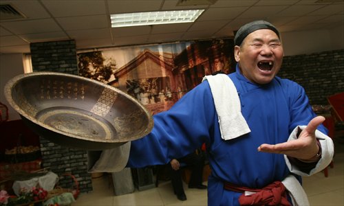The recent death of Zang Hong (pictured), affectionately dubbed the 'King of Hawking' in Beijing, has raised concerns about the craft's future. Photo: CFP 