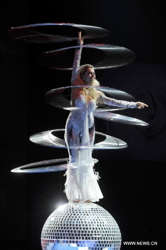 An artist performs during the opening ceremony of the 5th Men's and Women's Artistic Gymnastics Individual European Championships in Moscow, Russia, April 17, 2013. The event kicked off here on Wednesday. (Xinhua/Jiang Kehong) 