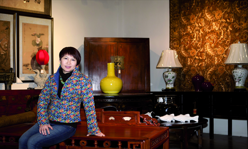 Quan Lili in her antique store, Lily's Antiques, in Chaoyang district. Photo: Courtesy of Lily's Antiques