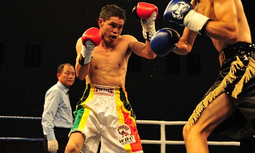 Qi Moxiang fights for the WBC belt in 2011. Photo: Courtesy of Han Yi