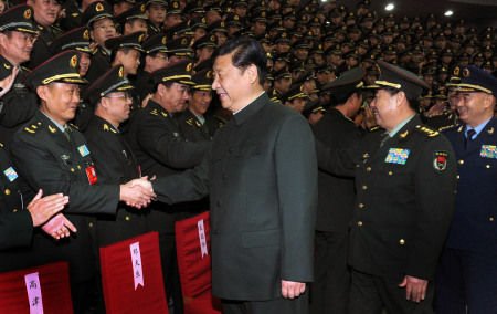 Xi Jinping, newly elected general secretary of the CPC Central Committee, meets delegates at the 8th Party congress of the People's Liberation Army (PLA)'s Second Artillery Force on December 5, 2012. 