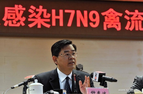 Zhong Dongbo, deputy director and spokesman of Beijing Municipal Health Bureau, speaks during a press conference in Beijing, capital of China, April 13, 2013. A seven-year-old girl in Beijing was infected with the H7N9 strain of bird flu, the first such case in the Chinese capital, local health authorities said Saturday. The case was confirmed following a test by the Chinese Center for Disease Control and Prevention early on Saturday. The child is being treated at the Beijing Ditan Hospital, and is in stable condition. (Xinhua/Li Wen)