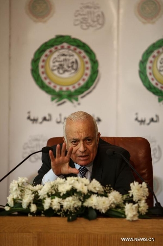 Nabil El-Arabi, secretary general of the Arab League (AL), speaks to the media after the Arab League emergency meeting at the level of permanent delegates to discuss the latest Israeli assaults on Al-Aqsa mosque, one of the three most sacred mosques for Muslims, at the AL headquarters in Cairo, May 12, 2013. (Xinhua/Amru Salahuddien) 