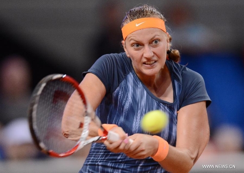 Petra Kvitova of the Czech Republic returns the ball during the first round match of Porsche Tennis Grand Prix against Annika Beck of Germany in Stuttgart, Germany, on April 24, 2013. Petra Kvitova won 2-1. (Xinhua/Ma Ning) 