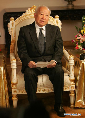 File photo taken on August 18, 2004 shows Norodom Sihanouk receiving an interview in Beijing, capital of China. Cambodian retired King Norodom Sihanouk died of natural cause at the age of 90 in China's capital city of Beijing, where he had his diseases treated by Chinese doctors, Cambodian Deputy Prime Minister Nhik Bun Chhay confirmed on October 15, 2012. Photo: Xinhua