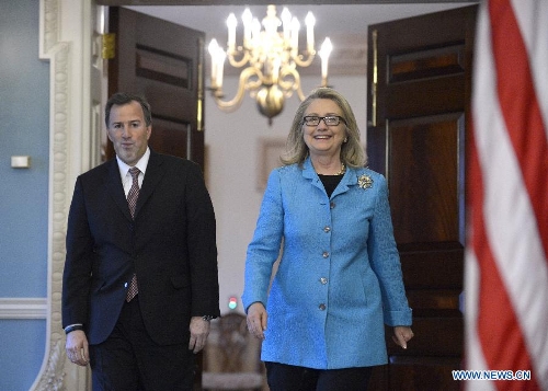 U.S. Secretary of State Hillary Clinton (R) walks to the media with Mexican Foreign Secretary Jose Antonio Meade at the Department of State in Washington D.C., capital of the United States, Jan. 30, 2013. It was the last bilateral meeting for Hillary Clinton as Secretary of State. (Xinhua/Zhang Jun)