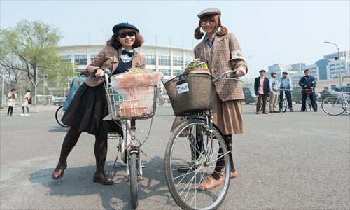 Chinese cyclists turn the cultural fashion tables by dressing in vintage British tweed jackets. Photos: Courtesy of Xie Kai, Yu Xiaodong and Yang Jun