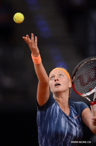 Petra Kvitova of the Czech Republic serves during the first round match of Porsche Tennis Grand Prix against Annika Beck of Germany in Stuttgart, Germany, on April 24, 2013. Petra Kvitova won 2-1. (Xinhua/Ma Ning) 