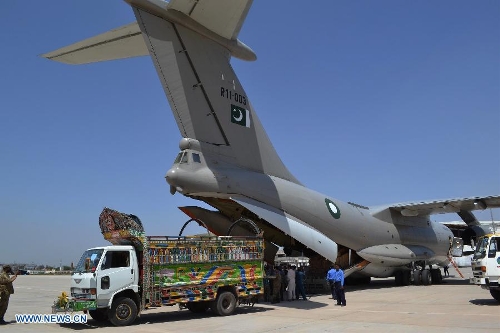 Pakistani workers unload boxes of electoral materials for the forthcoming parliamentary elections in central Pakistan's Multan on May 4, 2013. Pakistani Army has been deployed in nine out of 30 districts in sparsely populated Balochistan province. Violence has escalated as the country moves closer to historic elections, which are scheduled on May 11. (Xinhua/Stringer)