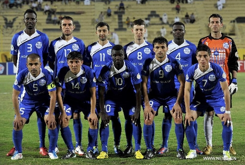 Players of Tajikistan's Ravshan SC pose for a group photo before the AFC Cup football match against Kuwait's Qadsia SC in Kuwait City, Kuwait, on April 3, 2013. Qadsia won the match 3-0. (Xinhua/Noufal Ibrahim) &nbsp;