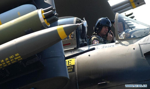 Pilot W.A.Jones gets ready to fly Spitfire A-1 Skyrider from Heritage Flight Museum at the 50th anniversary Abbotsford Airshow on Aug. 10, 2012 in Abbotsford, BC, Canada. Photo: Xinhua
