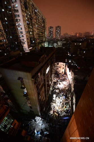 Photo taken on March 19, 2013 shows the blast locale of a residential building in Wuhan, capital of central China's Hubei Province. An explosion ripped through a residential building in Wuhan Tuesday night. Casualties from the blast that broke out at around 10 p.m. in Hanlai Square in the city's Hankou District are still unknown. (Xinhua/Cheng Min)Related:At least 1 dead in central China residential building blastWUHAN, March 20 (Xinhua) -- One body has been retrieved after an explosion ripped through a residential building in Wuhan, capital of central China's Hubei Province, Tuesday night, the local fire department said.Over ten people have been injured in the blast, the firefighters said.  Full story