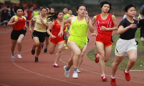 Students compete in a women's 800-meter race in the Guangxi Zhuang Autonomous Region. Photo: CFP