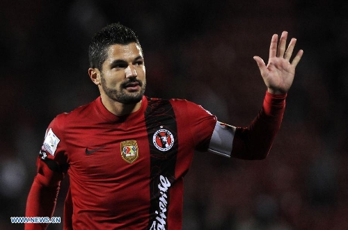 Javier Gandolfi of Mexico's Tijuana reacts during a Copa Libertadores soccer match against Brazil's Corinthians at the Caliente Stadium, in Tijuana, Mexico, on March 6, 2013. (Xinhua/Str) 