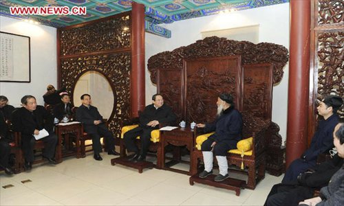 Yu Zhengsheng, a member of the Standing Committee of the Political Bureau of the Communist Party of China (CPC) Central Committee, visits Chinese Taoist Association in Beijing, capital of China, January 22, 2013. Yu visited national religious groups in Beijing from January 21 to 23.