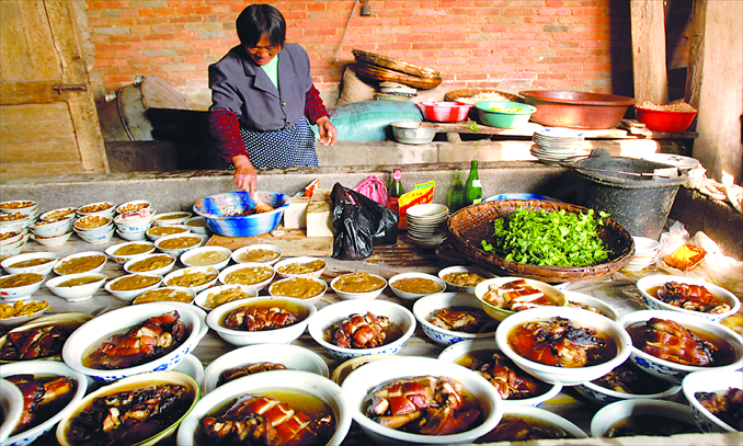 A woman prepares for a wedding feast for a rural family on the outskirts of Guiyang, Guizhou Province. Photo: CFP
