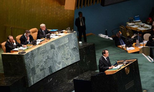 Li Baodong (R front), China's permanent representative to the United Nations, speaks during a UN General Assembly meeting on Syria, at the UN headquarters in New York, on May 15, 2013. China reaffirmed on Wednesday that political solution is the only right way out for the Syrian issue, stressing that forcibly pushing forward the vote on a resolution in the General Assembly doesn't help the situation. Photo: Xinhua