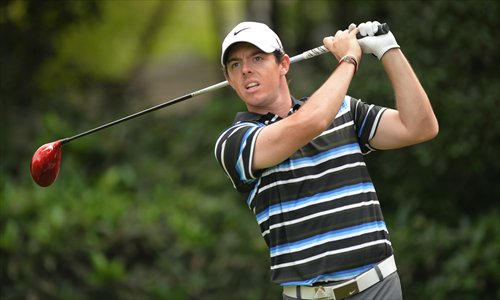 Rory McIlroy of Northern Ireland tees off at the fifth hole during day two of the WGC-HSBC Champions tournament at the Shanghai Sheshan International Golf Club on Friday. Photo: AFP