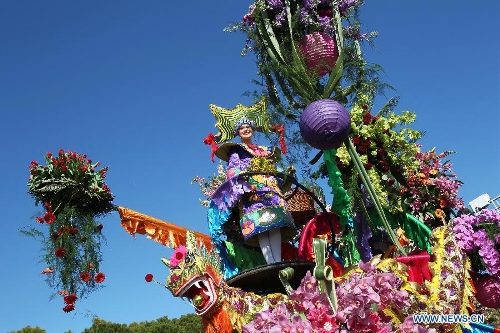 A dragon float is seen during the flowers parade of the 129th annual Nice Carnival parade, in Nice, southern France, March 2, 2013. (Xinhua/Gao Jing) 
